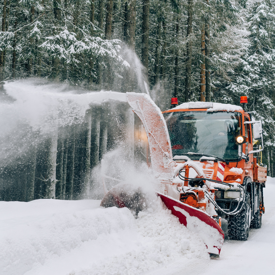 orange heavy-duty snow blower truck clearing road forest winter snow removal equipment transportation road-clearing vehicle safety lights