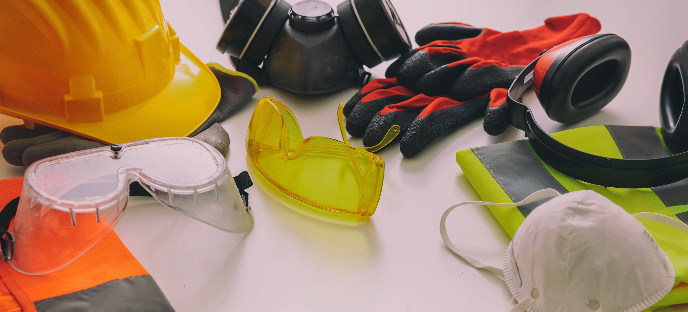 Various Personal Protective Equipment on a Table Image