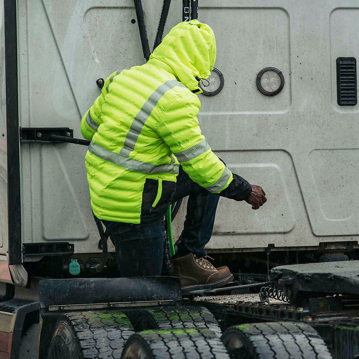 Hi-Vis Quilted Safety Parka With Hood Yellow Back View In Use Trucker Secondary Image